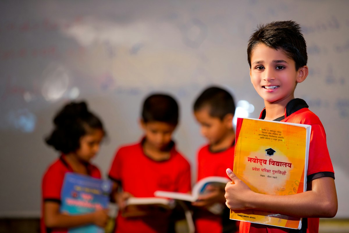Children holding their books
